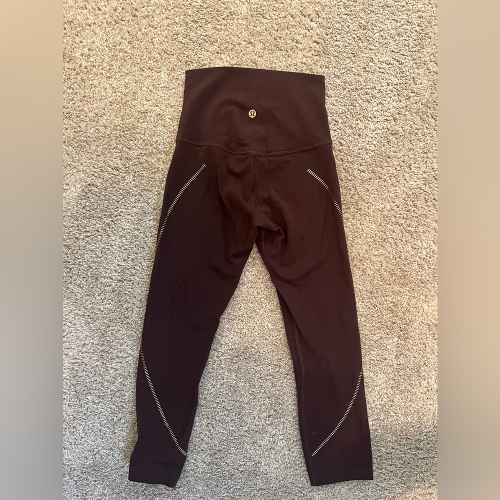 Lululemon Special Edition Burgundy/gold spiral crop legging